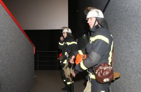 Rescuers of the State Emergency Service in the hall of the cinema