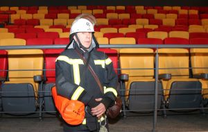 Rescuers of the State Emergency Service in the hall of the cinema