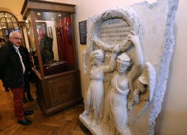 Visitors view the exhibits during the opening