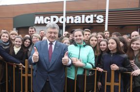 Petro Poroshenko is photographed with young people