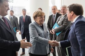 Petro Poroshenko, Angela Merkel, Gennady Zubko