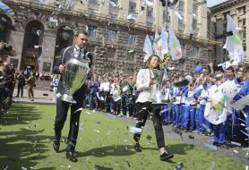 Andriy Shevchenko and Iya Andrushchak with cups