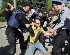 Police officers detained activist