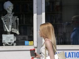 Skeleton in the window of a bookshop