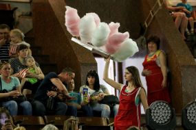 The girl sells sweet wool