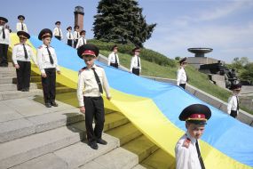 Cadets hold the expanded flag of Ukraine