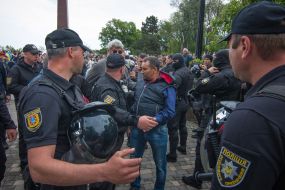 Police detain the offender