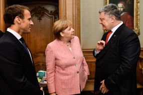 Emmanuelle Macron, Angela Merkel and Petro Poroshenko