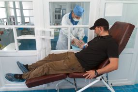 Donor donates blood