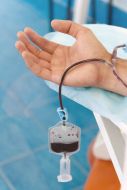 Blood collection system on the donor's hand