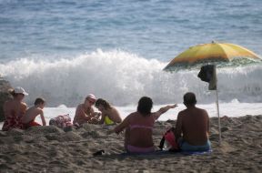People rest on the beach in Alanya (Turkey)