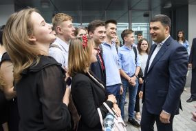 Vladimir Groisman communicates with students