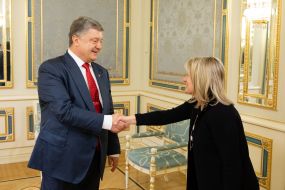Petr Poroshenko and Jamie Miller