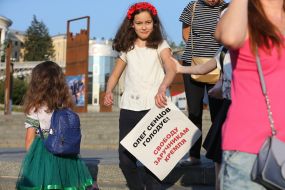 A girl with a poster