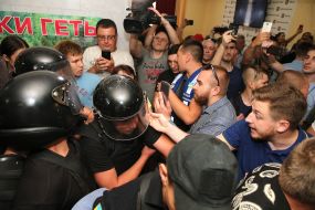 Clash between law enforcement officers and participants in the action in KSCA