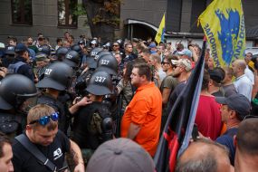 Law enforcers and protesters near 