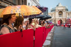 People under umbrellas