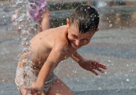 Boy playing with water