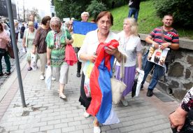 The woman opened the flag of Russia