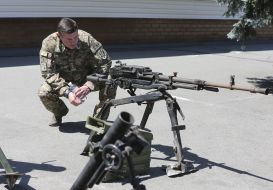 Vitaly Malikov examines weapons