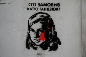 Screenwriting on the house with a portrait of Kateryna Gandzyuk