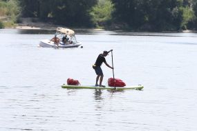 Anton Bondarenko on the SUP-board sails on the Dnieper
