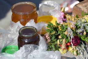 Banks with honey at a honey fair