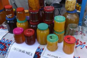Banks with honey at a honey fair