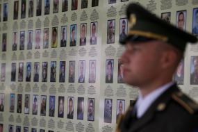 Honorary Guard soldier near the Memory Wall