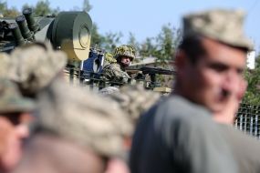 Army serviceman of the Armed Forces in the BTR