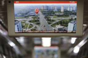 The monitor in the train car of the Kiev Metro