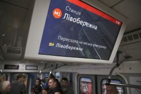 The monitor in the train car of the Kiev Metro