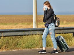 A woman wearing a gauze bandage