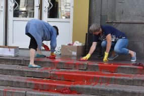 The poster of the film is poured in red paint