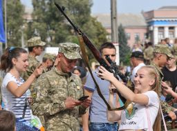 Girl with a sniper rifle