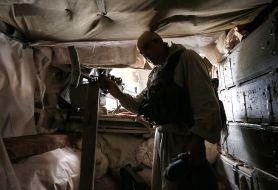 Ukrainian soldier in position