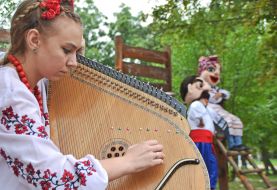 The girl plays the bandura