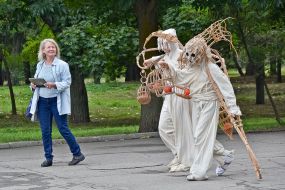 Animators in wicker costumes