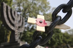 Wooden cross near the monument "Menorah"