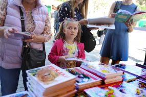 Girl holding book