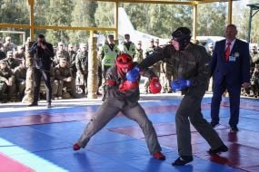 Soldiers of the National Guard overcome the obstacle