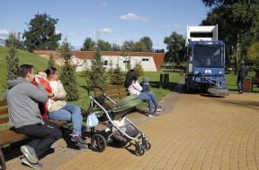 Family with a child is watching special equipment