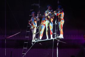 Acrobats under the dome of the circus