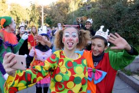An actress in a theatrical costume makes a sephi