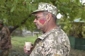 Serviceman with a figure on the face