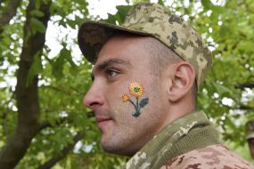 Serviceman with a figure on the face