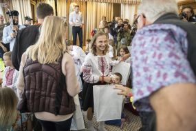 The girl holds a gift