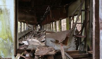 The destroyed passenger car at Yaniv station