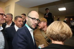 Sergey Gusovsky, doused with green paint