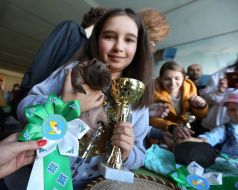 Girl holding guinea pig